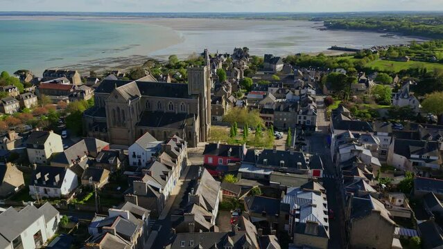 Saint-Meen church at Cancale, Brittany in France. Aerial circling