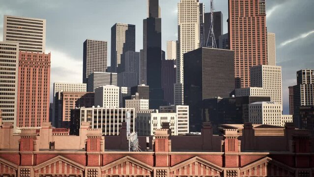 panoramic shot of a city's skyline at dusk, with the tops of its skyscrapers in view