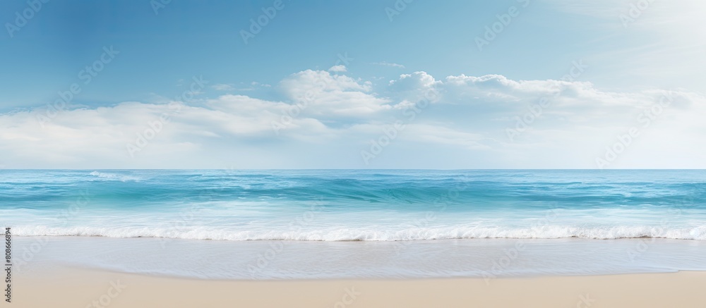 Poster copy space image of a serene and deserted beach and ocean backdrop