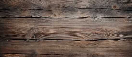 Fototapeta premium An aged wooden surface provides a textured background that allows for the insertion of a copy space image