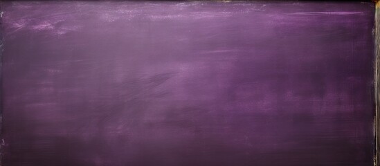 Copy space image of a purple blackboard with a blank chalkboard texture