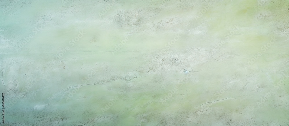 Aufkleber an abstract texture of a cement floor painted with a light green color providing a visually pleasing