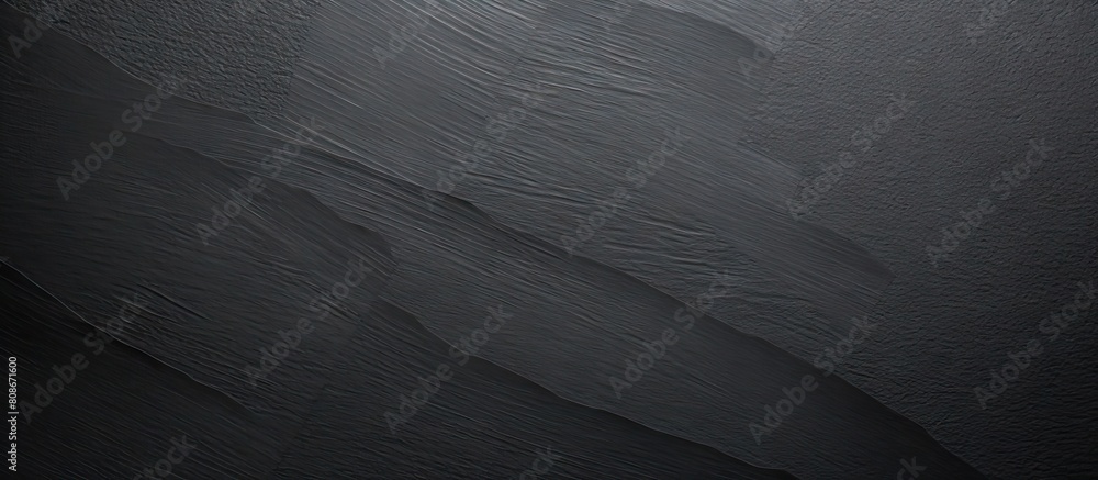 Poster a textured black paper with a sheet like appearance creates a background for copy space images