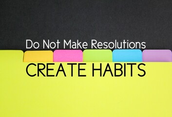colored paper with the words Do not make resolutions, create habits