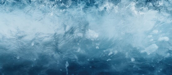 Obraz premium A winter themed image with a texture resembling frozen water The ice surface creates an abstract blue background perfect for a copy space image