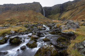 Grundarfoss, a tall waterfall in Snaefellsnes during Autumn, Iceland