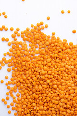 Red lentils pile isolated.Pile lentil isolated on white background.