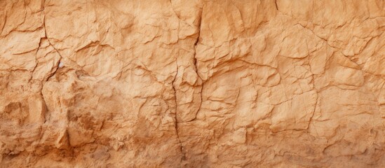 A small sandstone texture or background with a natural brown color perfect for design purposes Includes copy space for text or images