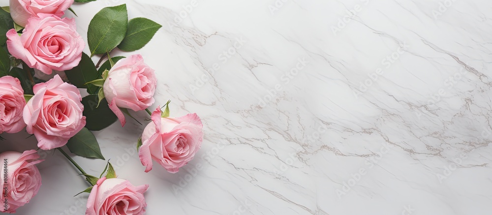 Poster a pink rose bouquet with flower bud framings sits on a white marble table creating a captivating ima