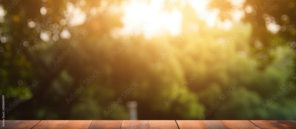 Poster a product display template with copy space featuring an empty wooden table top surrounded by a beaut