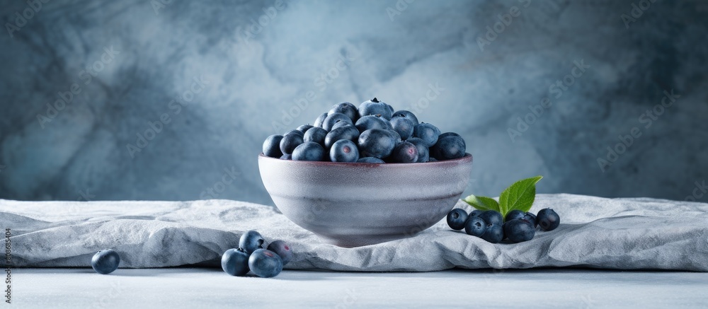 Aufkleber the marble table is adorned with a bowl filled with delectable fresh bilberries creating a captivati