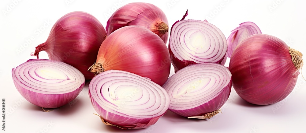 Aufkleber Close up isolated copy space image of a group of ripe whole and sliced red onions on a white background emphasizing the food concept
