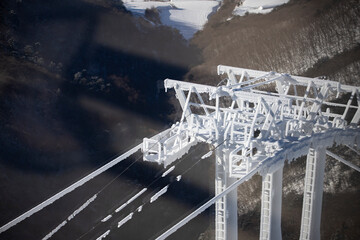 Cable car poles filled with ice and snow at Yongpyong Ski Resort, Mountain Winter South in Korea.