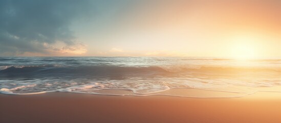 Obraz premium Beautiful beach with perfect sand illuminated by the lovely backlight creating a stunning copy space image