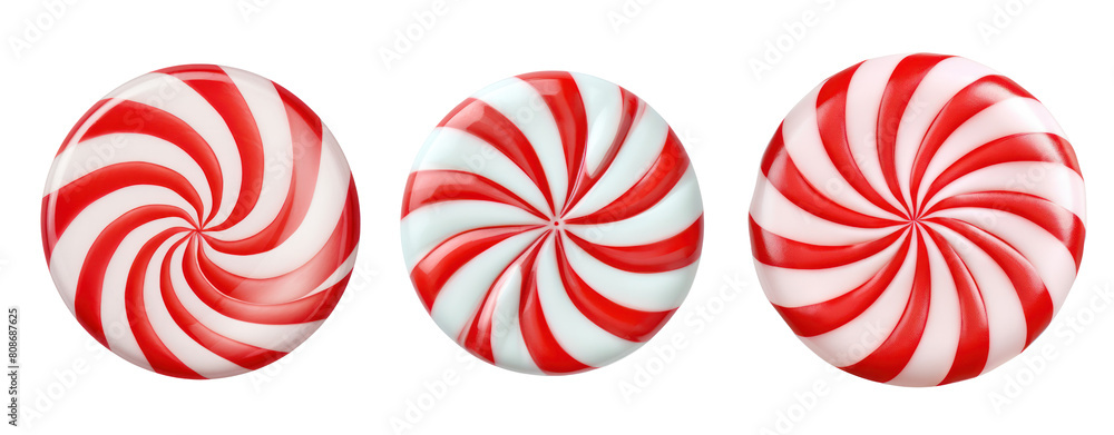 Wall mural three red and white peppermint candies on a black background.