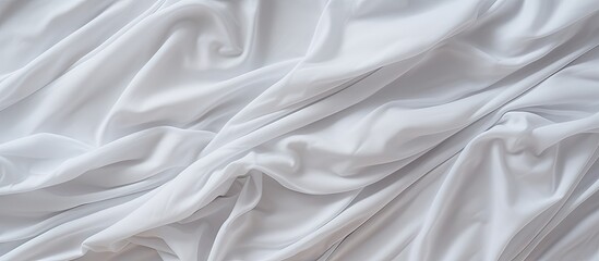 Background material featuring a wrinkled white comforter providing ample copy space for images