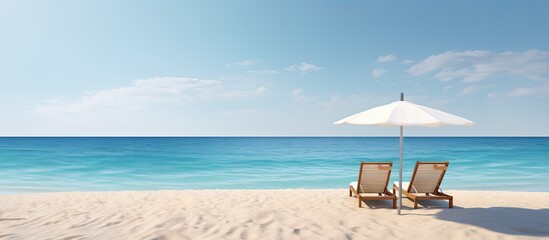 A serene beach scene showing two sunbeds facing the ocean with a generous amount of empty space for a copy. Copy space image. Place for adding text and design