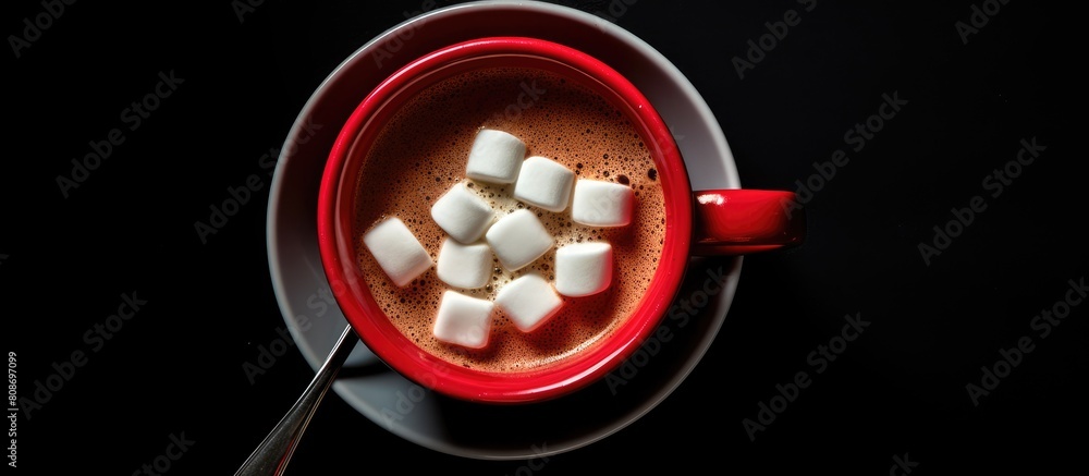 Aufkleber a top down view of a large red coffee cup with a spoon marshmallow slices and ample space for copyin