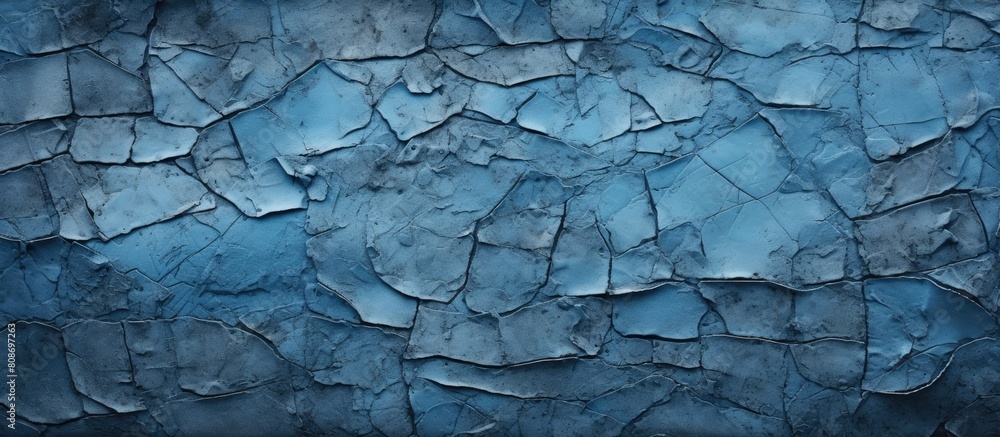 Poster an abstract background for design featuring an aged blue textured wall with crack lines and patches 