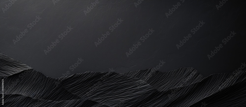 Poster a textured black paper with a sheet like appearance creates a background for copy space images