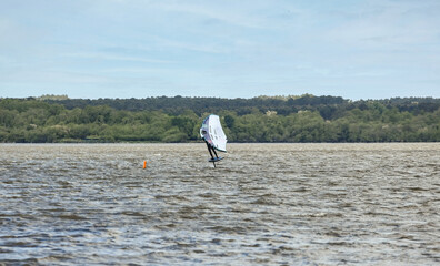 wing surfer at full speed on Lake Soustons in the southwest of France