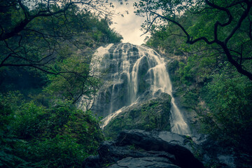 the waterfall on the mountain in Thailand with dramatic tone