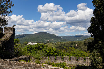 City of Gorizia, Castel on top the hill, wall and fortification, cannons. Panorama whole city. The beautiful streets and the castle behind them are a trace of history. Cultural Heritage Capital 2025.