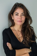 Naklejka premium Businesswoman Standing With Arms Crossed