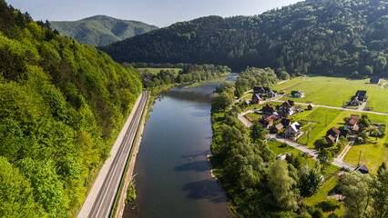 Szczawnica townscape and Dunajec River bends. Aerial drone view at springtime