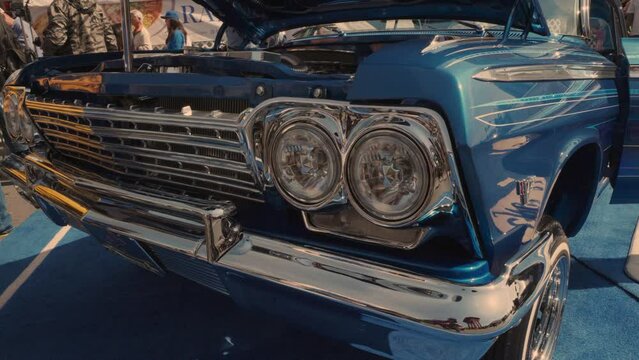 Old collectible lowrider car in the street