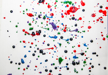 Multicolored splashes of paint drops	

