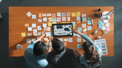 Time lapse of creative designer working together brainstorming idea by using sticky notes at...