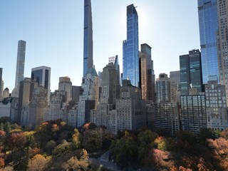 Autumn Central Park in New York with skyscrapers view from top. Aerial of NYC Central Park panorama in Autumn. Autumn in Central Park. Autumn NYC. Central Park Fall foliage.