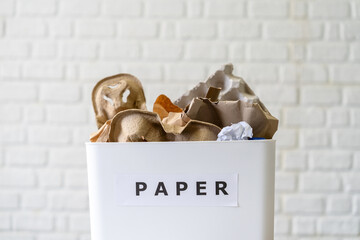 Image of paper in a bin for recycling