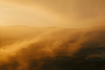 Obraz premium Golden hour fog over mountain ridges