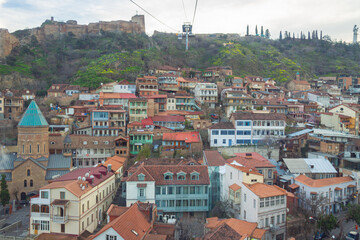 View of cable car above Tbilisi Georgia with view of Old town - obrazy, fototapety, plakaty