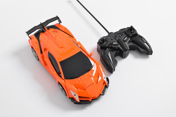 Remote controlled toy car with a game controller. RC cars can turn into robots