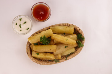 Fried Yucca or Cassava Sticks with Sauce. 
