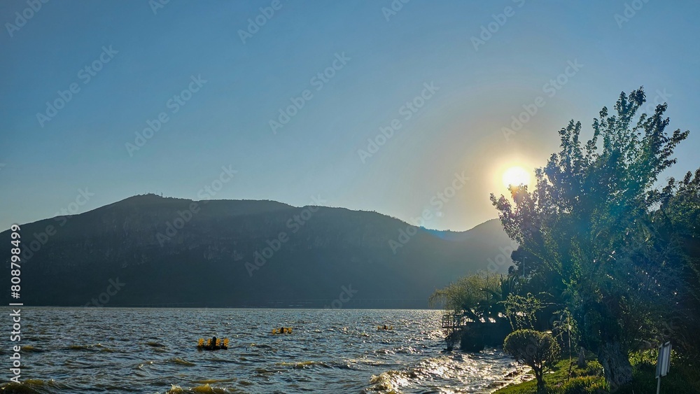 Canvas Prints Scenic view of Dianchi Lake, Yunnan Province, China, with a bright sun in the sky