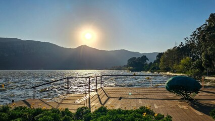 Scenic view of Dianchi Lake, Yunnan Province, China, with a bright sun in the sky