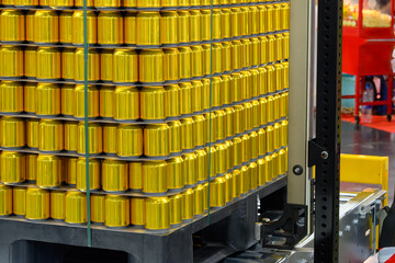 The pallet of gold aluminum cans.