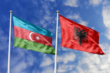 3d illustration. Azerbaijan and Albania Flag waving in sky. High detailed waving flag. 3D render. Waving in sky. Flags fluttered in the cloudy sky.