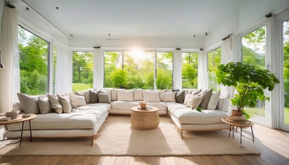 Luxurious sunlit living room with a plush sectional sofa, large windows to green views, rustic coffee table, and vibrant indoor plant.