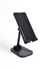Phone holder stand that can be adjusted to height angle isolated on white background. holder for phone, phone stand, mount, universal