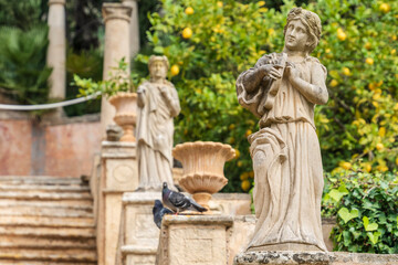 Fototapeta premium Raixa, muses of poetry on the monumental staircase, municipality of Bunyola, Majorca, Balearic Islands, Spain