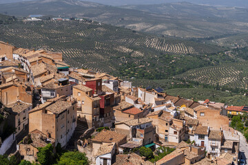 La Iruela houses with a sea of olive trees behind,, Guadalquivir valley, Sierras de Cazorla, Segura...