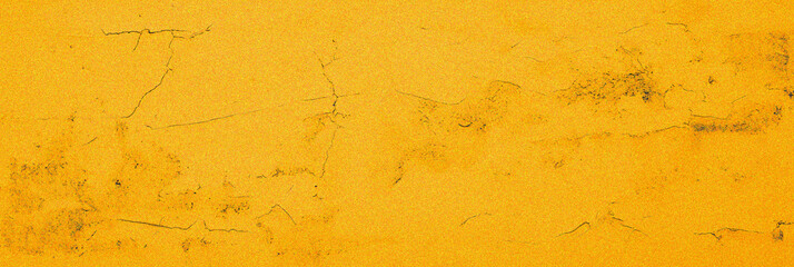 Yellow trendy grainy cement grunge textured background. Gold amber noise cracks wall. Old vintage wide backdrop design banner