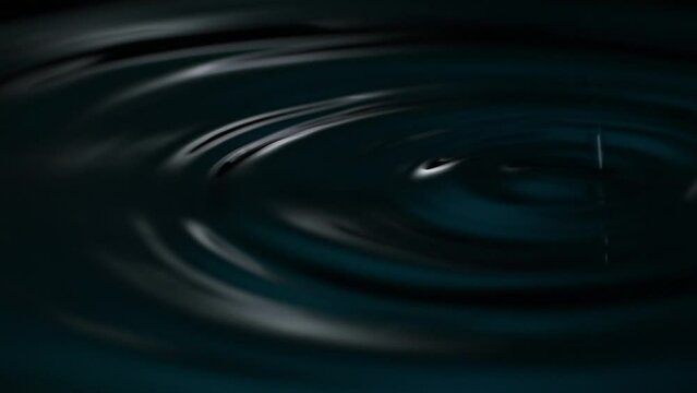 Water Droplet Impacting Surface in Darkness. Close-up, shallow dof.