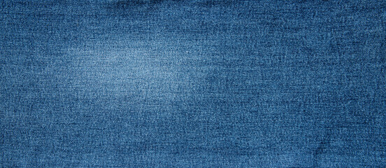 texture of light blue jeans denim fabric background	