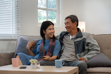 Relaxed elderly couple enjoying weekend together at home. senior retirement concept